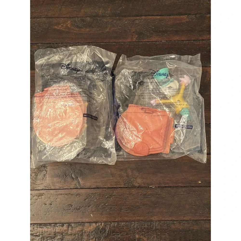 2021 McDonald's Disney's Anniversary Collection #33 Pooh and #37 Mad Hatter